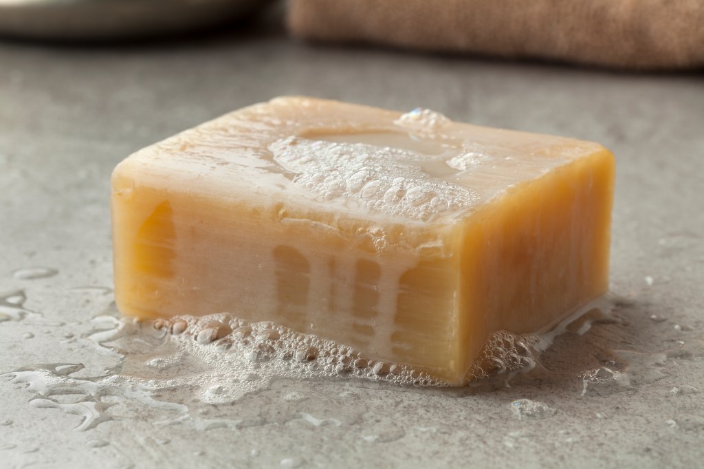 An image of a bar of soap with lather